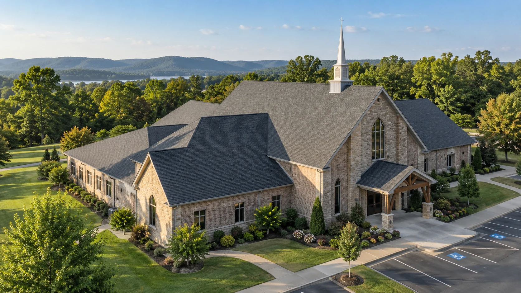 Architectural illustration of a stone church with a charcoal shingle roof